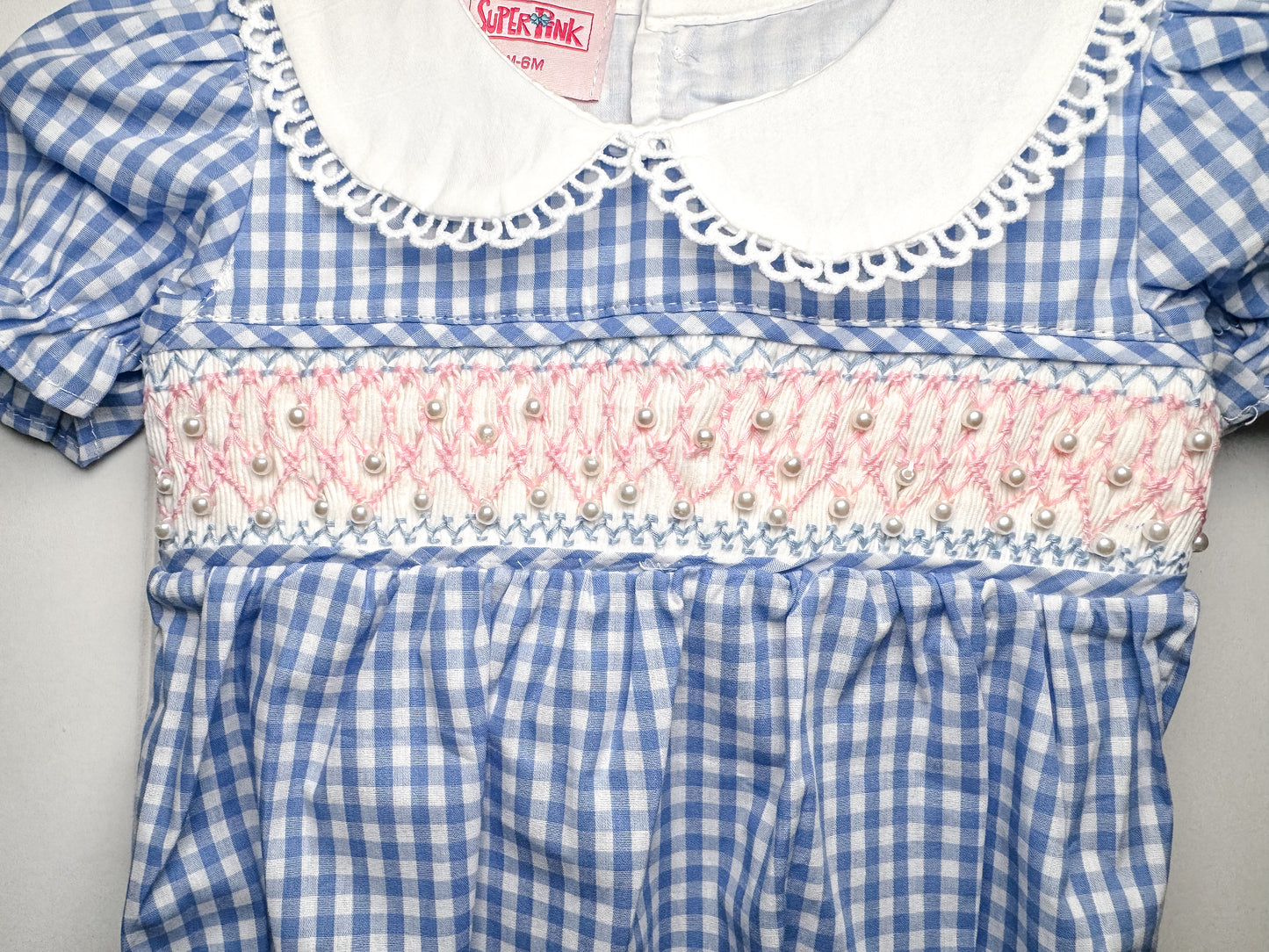 RTS: Girl’s Blue Smocked Pearl Bubble